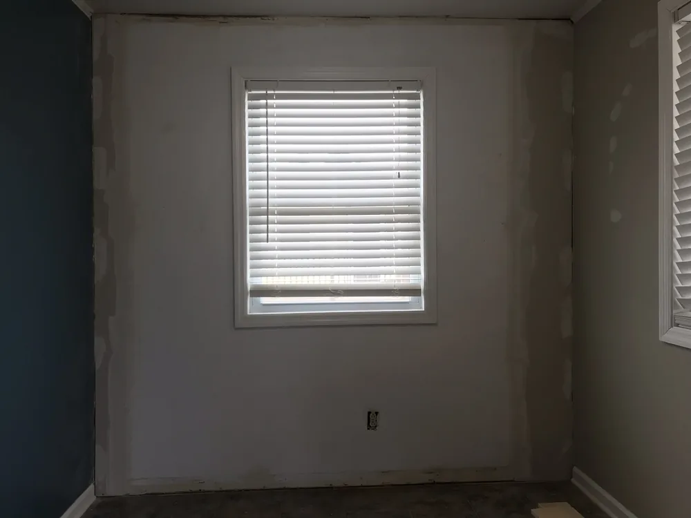 Before: dining nook remodel with shiplap wall