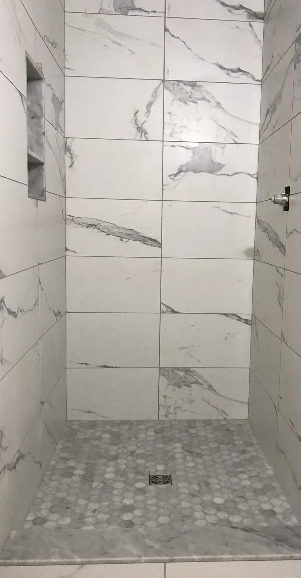 After: marble tile shower rebuild