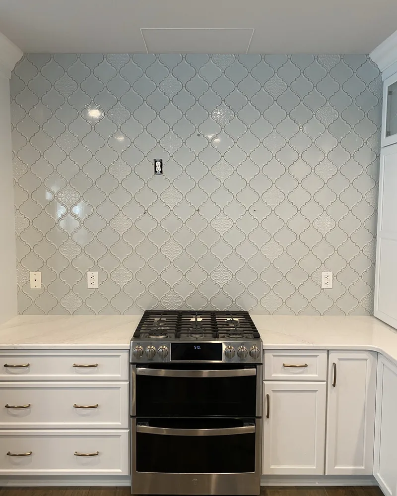 Kitchen remodel with an arabesque tile backsplash, by Creative Construction Concepts in Los Angeles