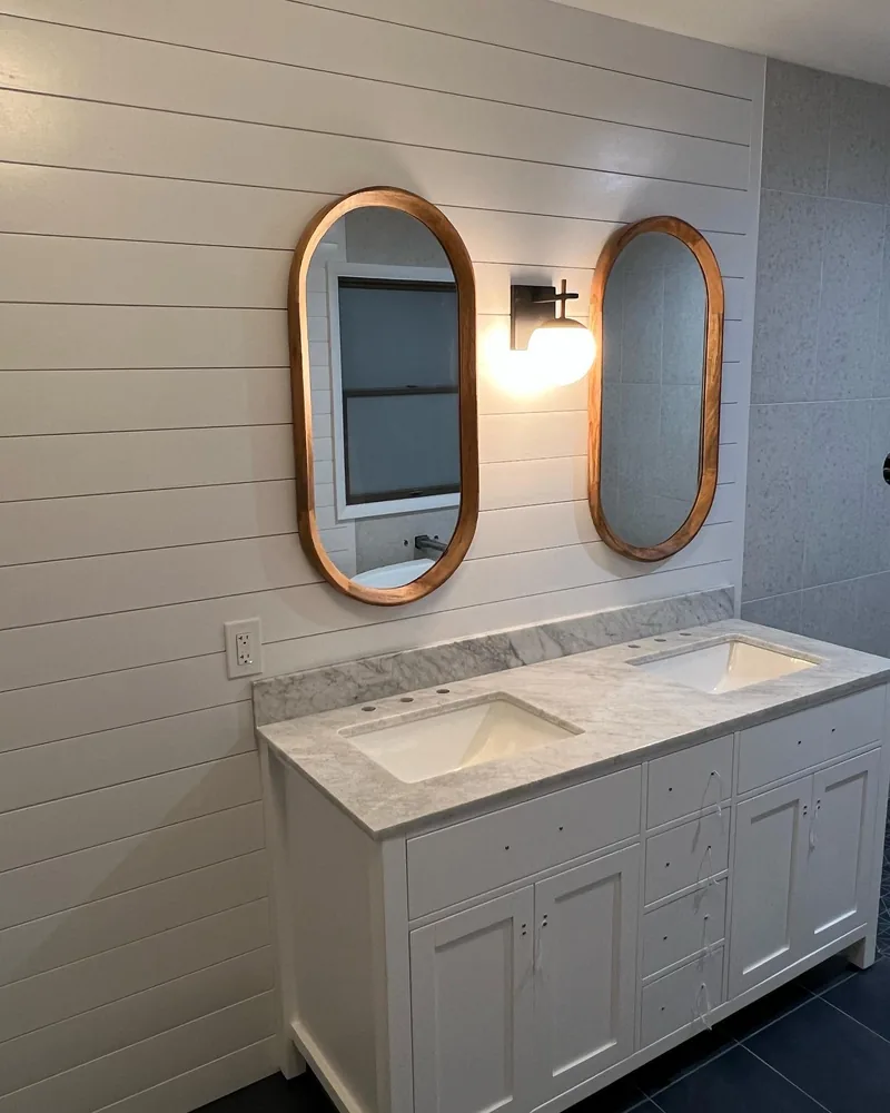 Double vanity with shiplap and stone tops, by Creative Construction Concepts in Los Angeles